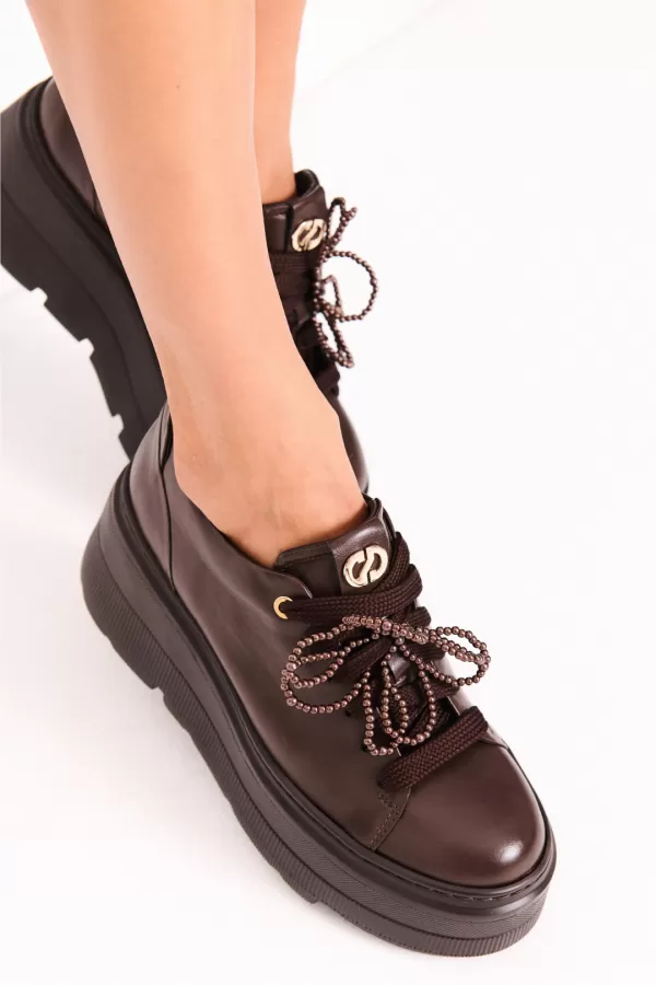 Zobacz Brązowe sneakersy skórzane CARINII--B10463-T82-000-000-G36