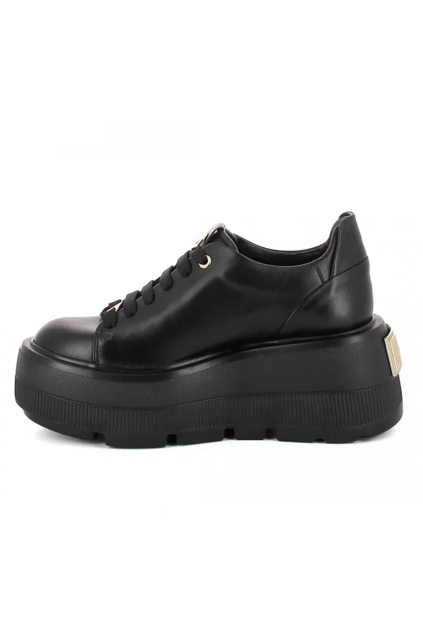 Zobacz Czarne skórzane  sneakersy  CARINII--B10307-E50-000-000-G36
