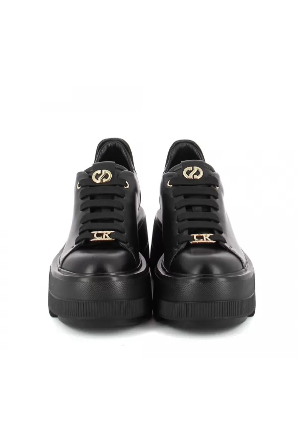 Zobacz Czarne skórzane  sneakersy  CARINII--B10307-E50-000-000-G36
