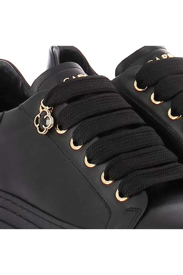 Zobacz Czarne sneakersy skórzane CARINII--B10467-E50-000-000-G74