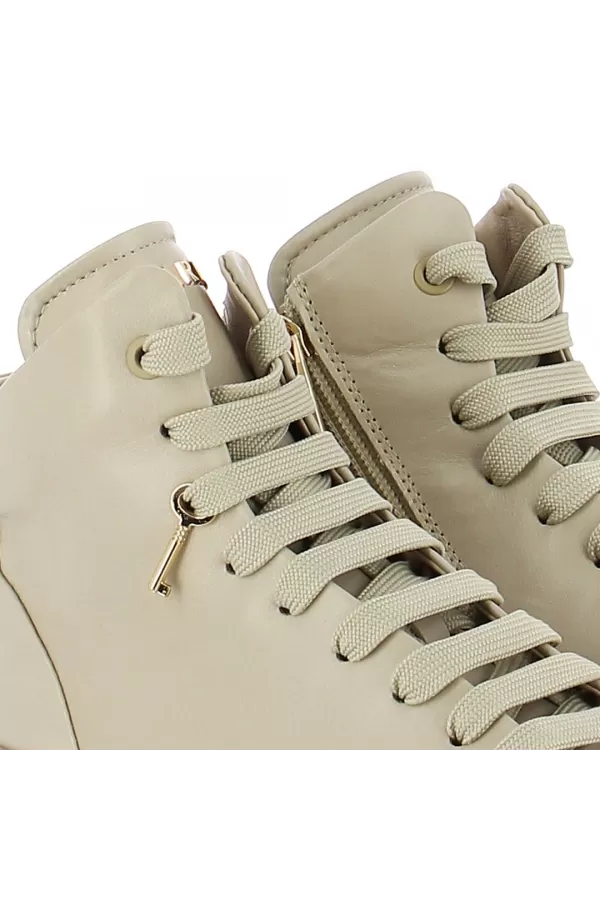 Zobacz Beżowe sneakersy skórzane CARINII--B9544-T43-000-000-F69