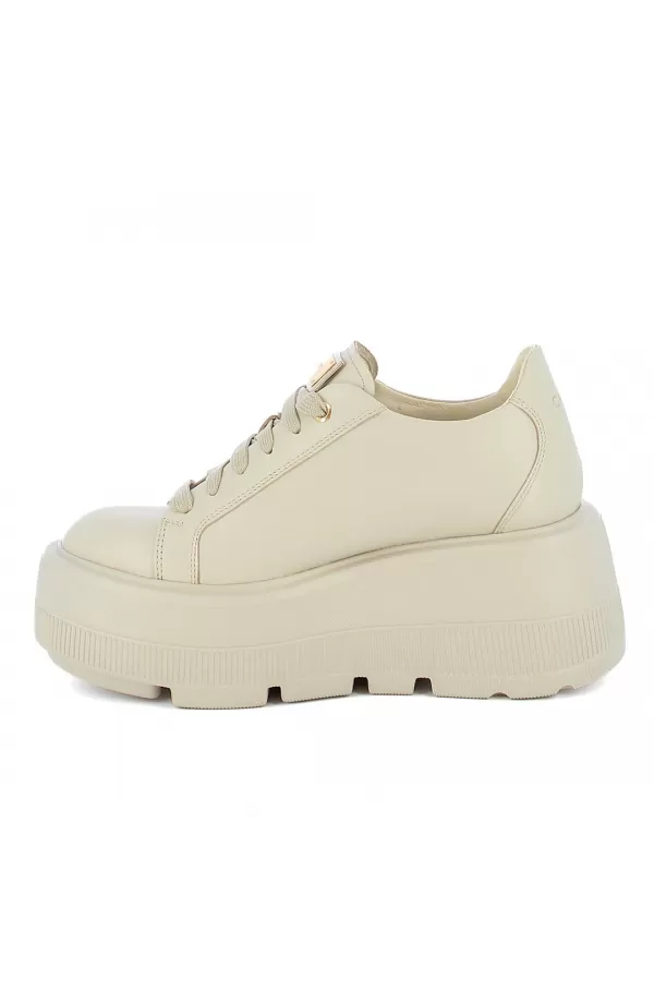 Zobacz Modne beżowe sneakersy  CARINII--B10303-T44-000-000-G36