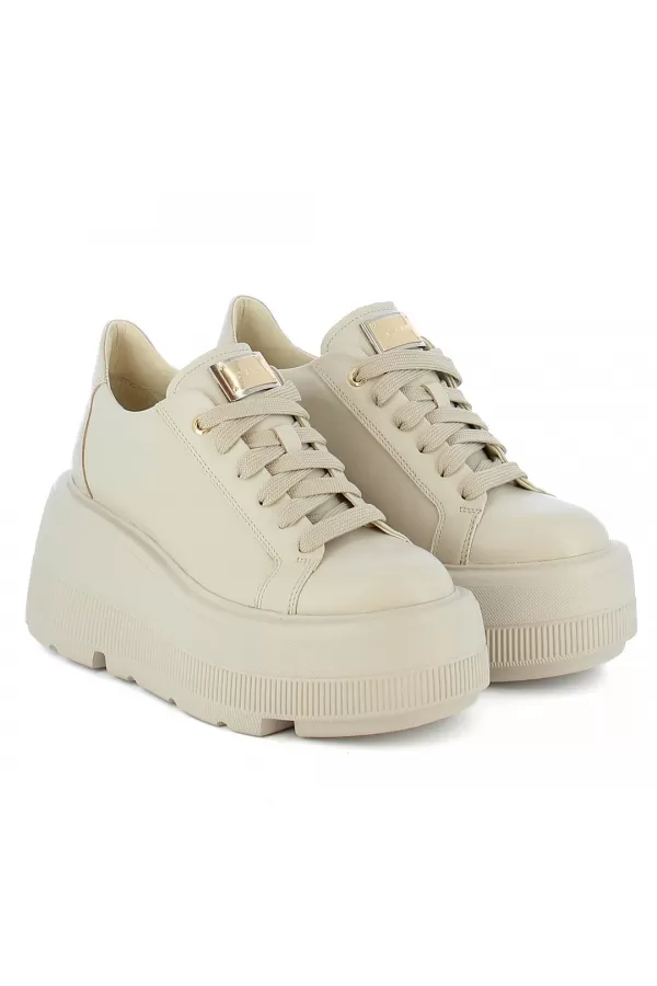 Zobacz Modne beżowe sneakersy  CARINII--B10303-T44-000-000-G36