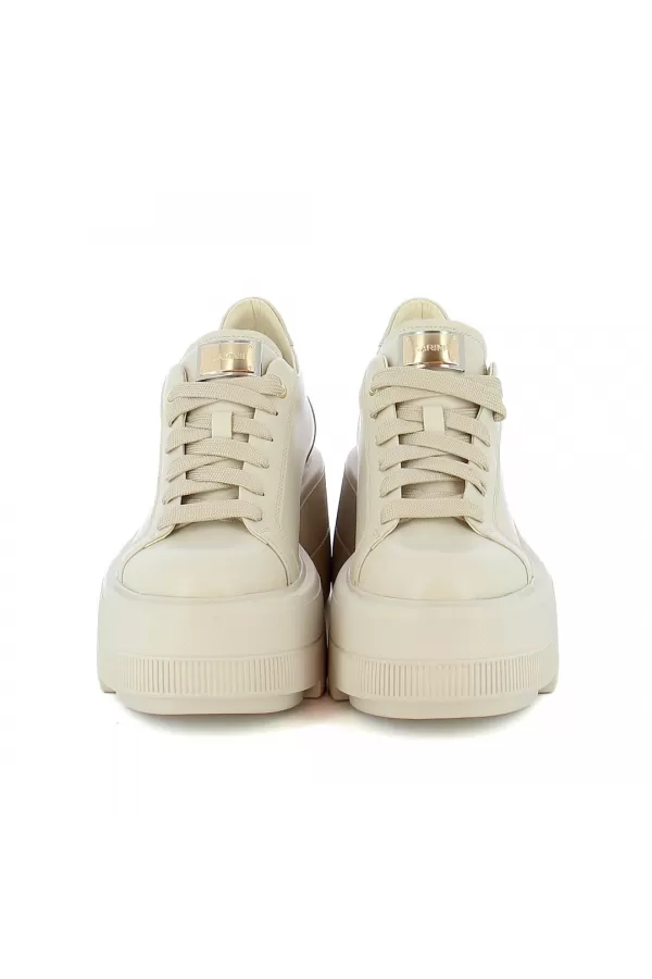 Zobacz Modne beżowe sneakersy  CARINII--B10303-T44-000-000-G36