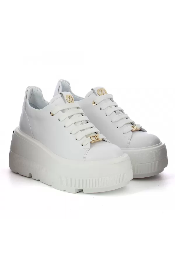 Zobacz Białe skórzane  sneakersy  CARINII--B10307-L46-000-000-G36