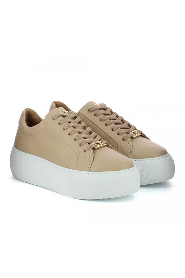 Zobacz Beżowe sneakersy skórzane CARINII--B10329-491-000-000-000