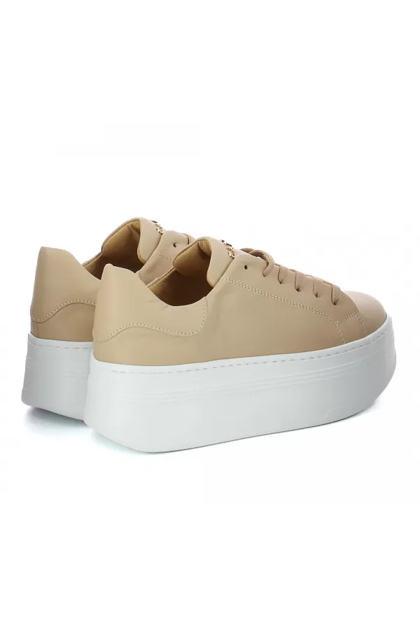 Zobacz Beżowe sneakersy skórzane  CARINII--B10332-491-000-000-000