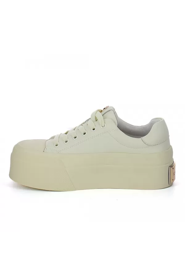 Zobacz Kremowe sneakersy z ozdobą CARINII--B10032-491-000-000-000