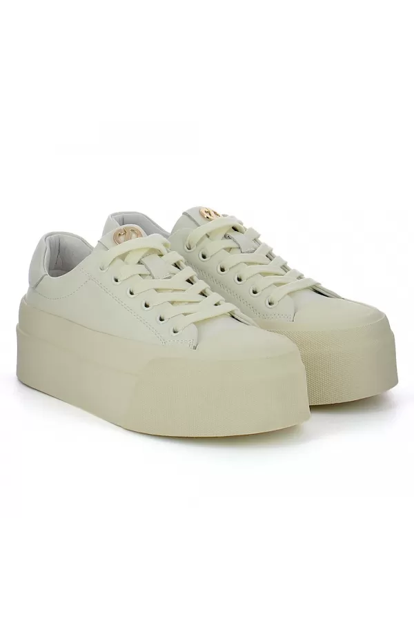 Zobacz Kremowe sneakersy z ozdobą CARINII--B10032-491-000-000-000