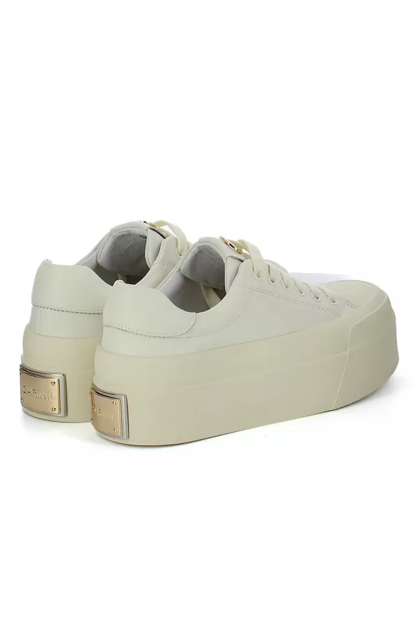 Zobacz Kremowe sneakersy z ozdobą CARINII--B10032-491-000-000-000