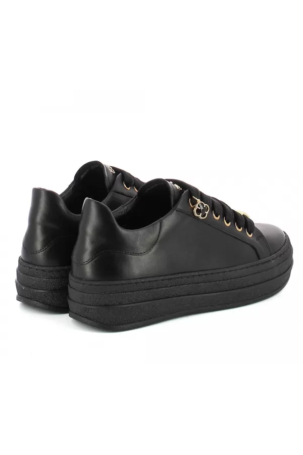 Zobacz Czarne sneakersy skórzane CARINII--B10467-E50-000-000-G74