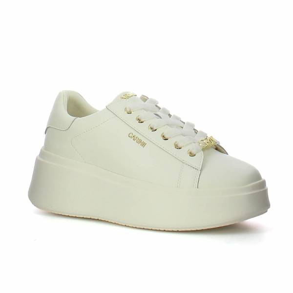 Białe skórzane sneakersy CARINII B10679-L46-000-000-MO1