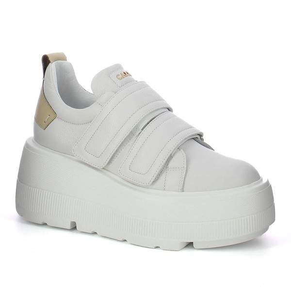 

Białe sneakersy na platformie CARINII B9400-I81-S30-000-G36