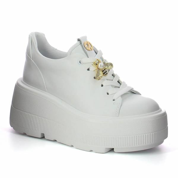 

Białe sneakersy na platformie CARINII B96134-L46-000-000-G36