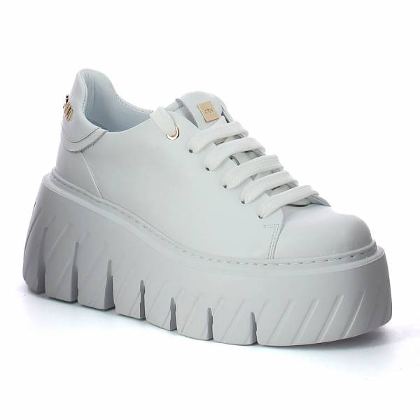 

Białe sneakersy na platformie CARINII B10076-L46-000-000-G75