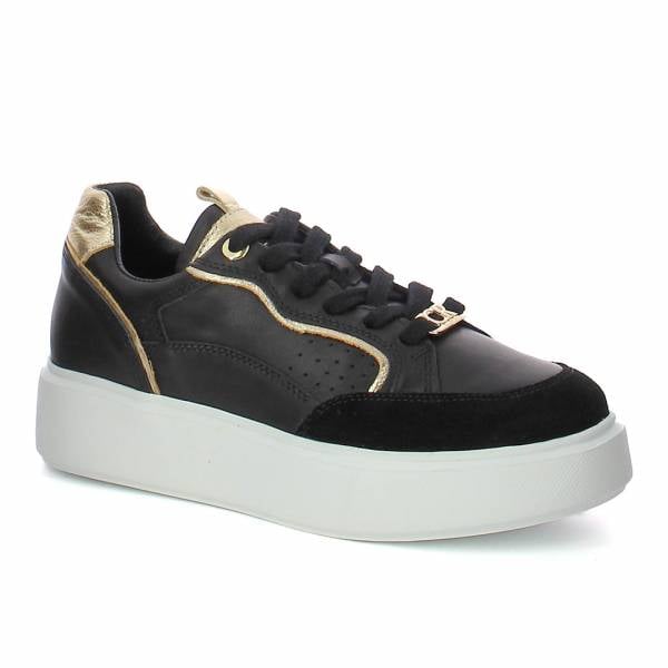 

Czarne sneakersy na białej platformie CARINII B9977-353-180-000-000